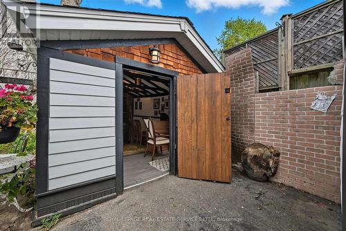 Garage has been Reimagined as a British-Style Pub - 677 Greenwood Drive, Burlington, ON - Outdoor With Exterior