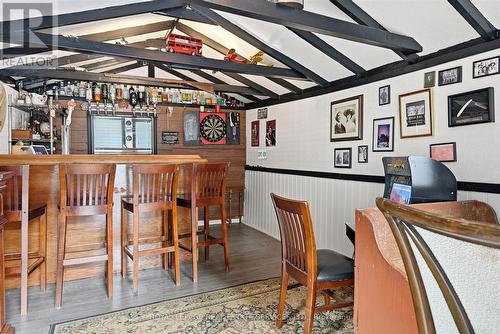Garage has been Reimagined as a British-Style Pub - 677 Greenwood Drive, Burlington, ON - Indoor Photo Showing Other Room