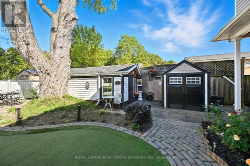 Enjoy a Beautiful Rose Garden & Turf Putting Green - 677 Greenwood Drive, Burlington, ON - Outdoor