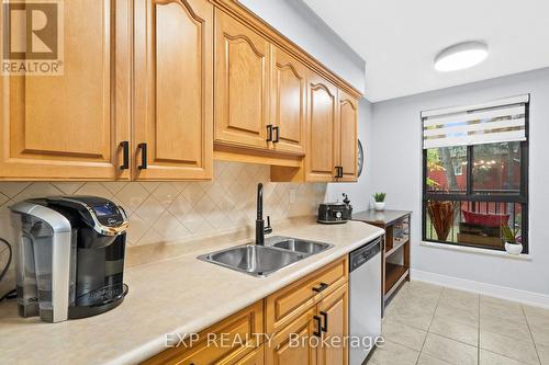 203 - 15390 Yonge Street, Aurora, ON - Indoor Photo Showing Kitchen With Double Sink