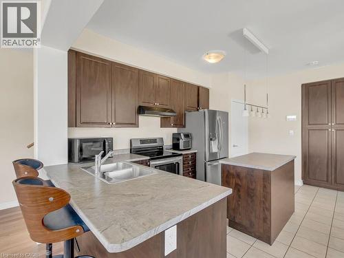84 Rainbow Drive, Caledonia, ON - Indoor Photo Showing Kitchen With Stainless Steel Kitchen With Double Sink