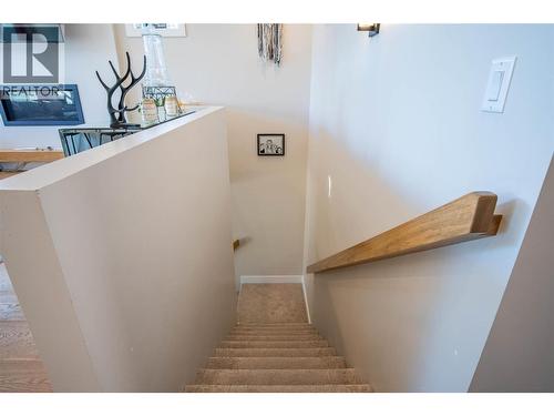 Stairs to Basement - 10335 Long Road, Lake Country, BC - Indoor Photo Showing Other Room