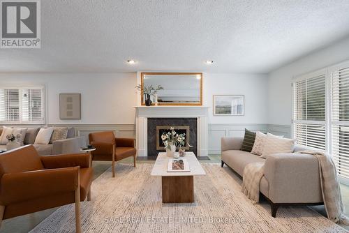 172 Burnhamthorpe Road, Toronto, ON - Indoor Photo Showing Living Room With Fireplace
