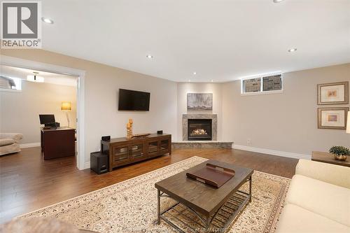 212 Woodycrest, Kingsville, ON - Indoor Photo Showing Living Room With Fireplace
