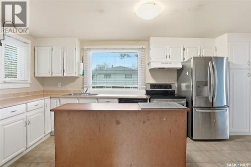 2023 20Th Street W, Saskatoon, SK - Indoor Photo Showing Kitchen With Double Sink