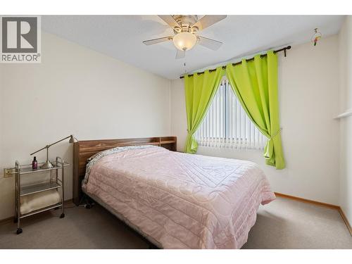1035 Bernard Avenue Unit# 104, Kelowna, BC - Indoor Photo Showing Bedroom