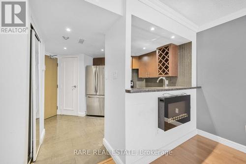 310 - 1001 Bay Street, Toronto, ON - Indoor Photo Showing Other Room With Fireplace