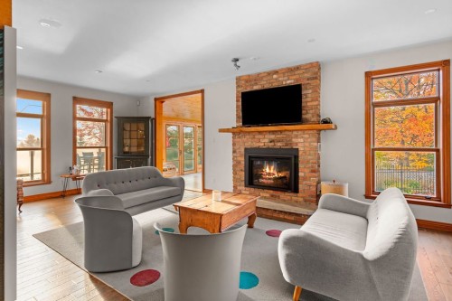 Salon - 200 Ch. De Villandry, Saint-Adolphe-D'Howard, QC - Indoor Photo Showing Living Room With Fireplace