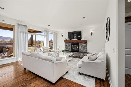 12815 Shoreline Drive, Lake Country, BC - Indoor Photo Showing Living Room With Fireplace