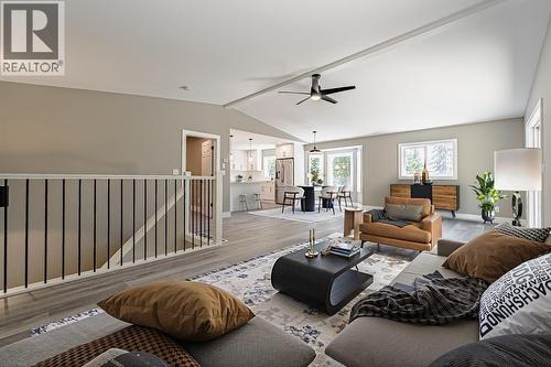 Virtual Staged L/R Photo - 7430 Crowfoot Drive, Anglemont, BC - Indoor Photo Showing Living Room