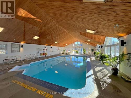 402 - 24 Ramblings Way, Collingwood, ON - Indoor Photo Showing Other Room With In Ground Pool