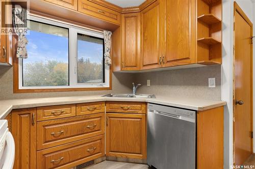 100 Knowles Crescent, Regina, SK - Indoor Photo Showing Kitchen With Double Sink