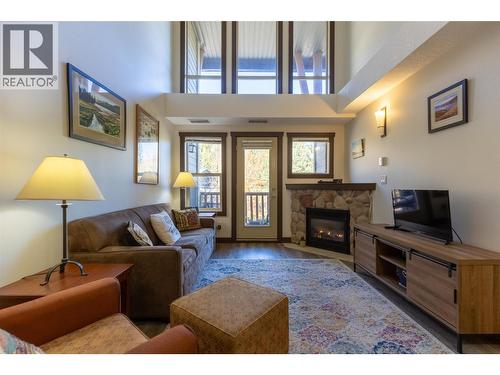 1500 Mcdonald Avenue Unit# 416, Fernie, BC - Indoor Photo Showing Living Room With Fireplace