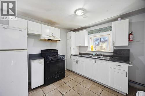 150 College Avenue North, Sarnia, ON - Indoor Photo Showing Kitchen With Double Sink
