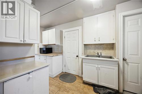 150 College Avenue North, Sarnia, ON - Indoor Photo Showing Kitchen With Double Sink