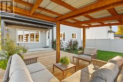 Flower beds at backyard and along side of house - 