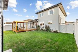 PVC fence w/ yard access on both sides of the home - 