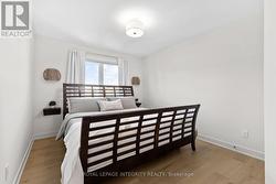 Large second bedroom w/ hardwood flooring - 