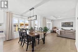 Dining room w/ access to covered back porch & yard - 