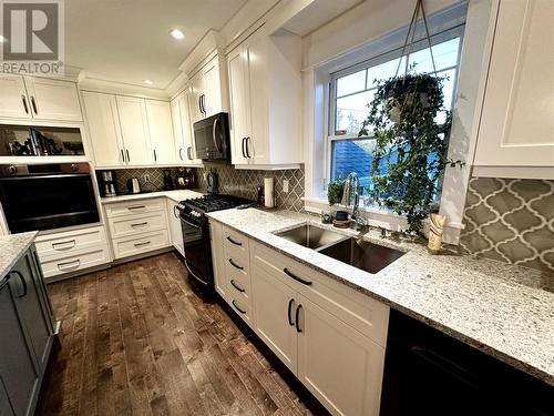 15 Ivany'S Road, Grand Falls-Windsor, NL - Indoor Photo Showing Kitchen With Double Sink
