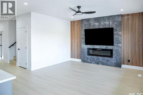 462 Nazarali Manor, Saskatoon, SK - Indoor Photo Showing Living Room With Fireplace