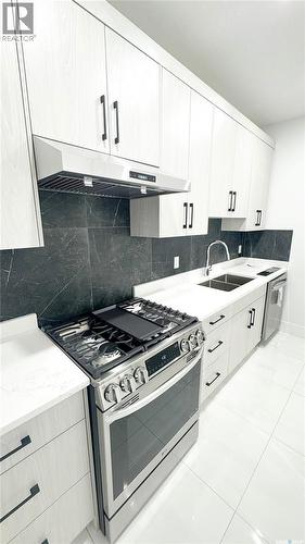 462 Nazarali Manor, Saskatoon, SK - Indoor Photo Showing Kitchen With Double Sink With Upgraded Kitchen