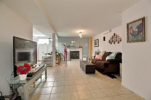 Salle familiale - 1242 Rue Des Tourterelles, Magog, QC - Indoor Photo Showing Living Room With Fireplace