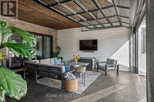 Indoor/Outdoor Space - Garage Door and Screen Door - 2439 Garrison Road, Fort Erie (Ridgeway), ON -  With Exterior