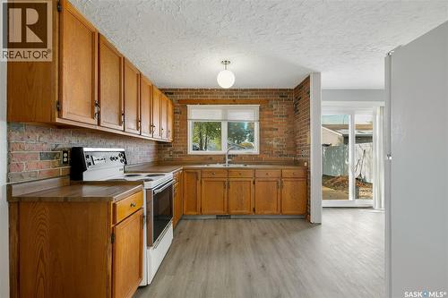 182 Hamilton Street N, Regina, SK - Indoor Photo Showing Kitchen With Double Sink