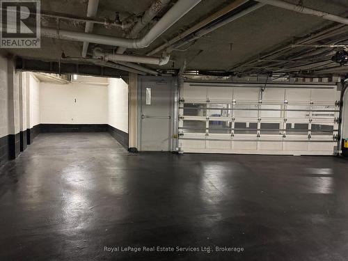 202 - 70 Stewart Street, Oakville (Co Central), ON - Indoor Photo Showing Garage