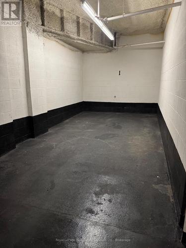 202 - 70 Stewart Street, Oakville (Co Central), ON - Indoor Photo Showing Garage
