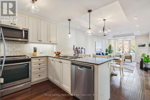 202 - 70 Stewart Street, Oakville (Co Central), ON - Indoor Photo Showing Kitchen With Stainless Steel Kitchen With Double Sink With Upgraded Kitchen