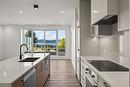 306-3340 Lakeshore Drive, Kelowna, BC  - Indoor Photo Showing Kitchen With Double Sink With Upgraded Kitchen 