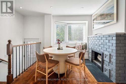 18 Sydenham Street, Toronto, ON - Indoor Photo Showing Dining Room With Fireplace