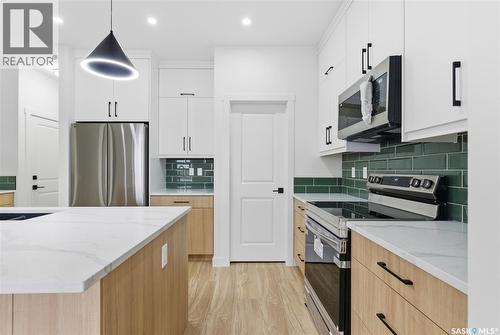 311 Sharma Crescent, Saskatoon, SK - Indoor Photo Showing Kitchen With Upgraded Kitchen
