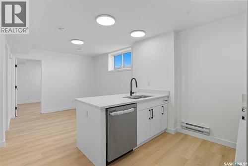 311 Sharma Crescent, Saskatoon, SK - Indoor Photo Showing Kitchen With Double Sink