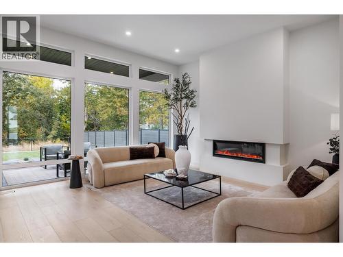 4234 Russo Street, Kelowna, BC - Indoor Photo Showing Living Room With Fireplace