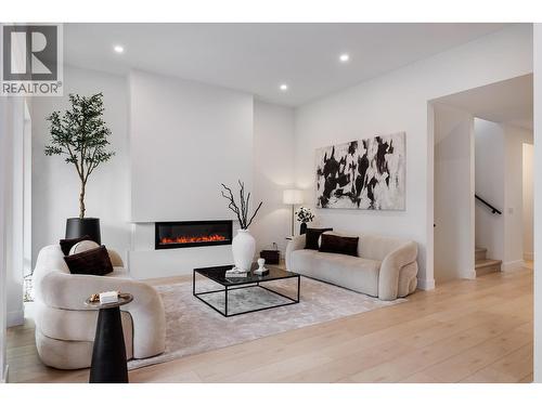 4234 Russo Street, Kelowna, BC - Indoor Photo Showing Living Room With Fireplace