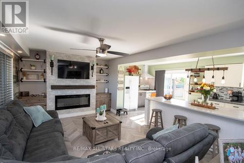 1412 7A Highway, Kawartha Lakes (Manvers), ON - Indoor Photo Showing Living Room With Fireplace