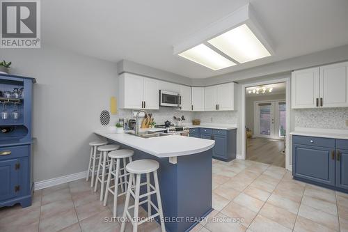 28 - 40 Quinella Drive, London South (South C), ON - Indoor Photo Showing Kitchen With Double Sink
