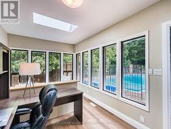 Sunroom overlooking heated pool - 