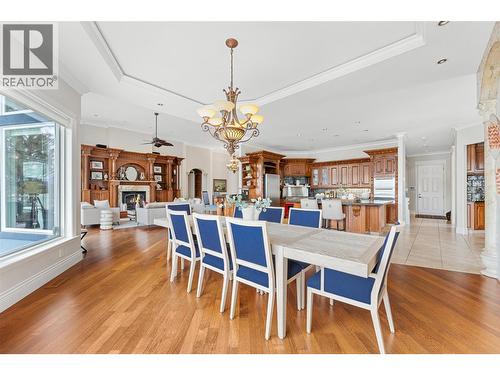 2543 Lucinde Road, West Kelowna, BC - Indoor Photo Showing Dining Room With Fireplace
