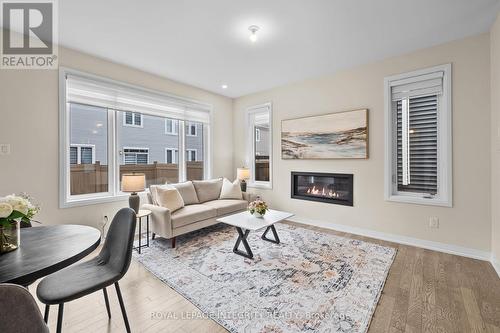 807 Mercier Crescent E, Ottawa, ON - Indoor Photo Showing Living Room With Fireplace