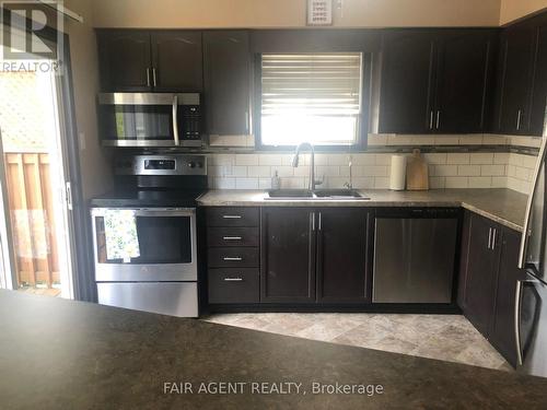 562 Erinbrook Drive, Kitchener, ON - Indoor Photo Showing Kitchen With Double Sink