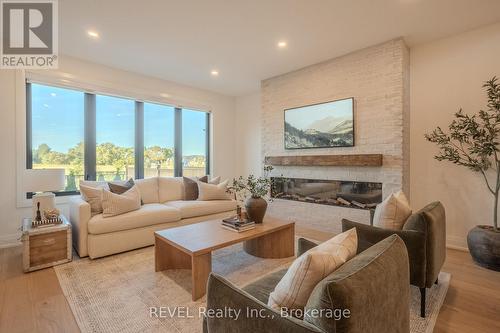 21 Arsenault Crescent, Pelham (Fonthill), ON - Indoor Photo Showing Living Room With Fireplace