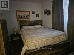 MAIN FLOOR BEDROOM - 