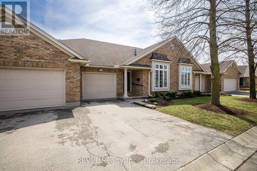 23 - 1439 Niagara Stone Road, Niagara-On-The-Lake (Virgil), ON - Outdoor With Facade