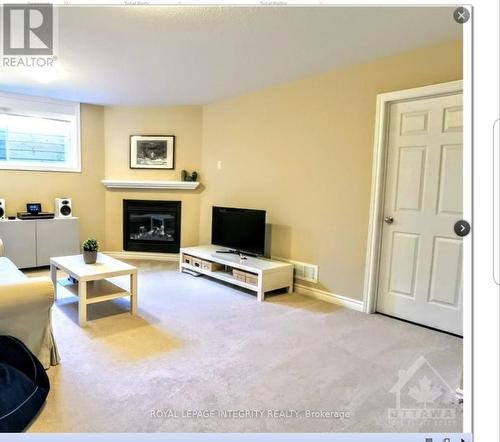 348 Tourmaline Crescent, Ottawa, ON - Indoor Photo Showing Living Room With Fireplace