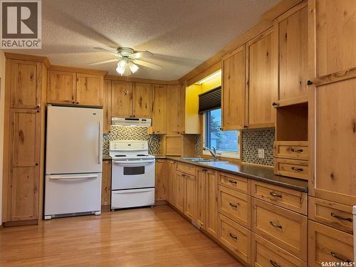 127 Broadway Street, Foam Lake, SK - Indoor Photo Showing Kitchen With Double Sink