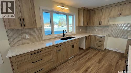 21 Murraydale Crescent, Maple Creek, SK - Indoor Photo Showing Kitchen With Double Sink